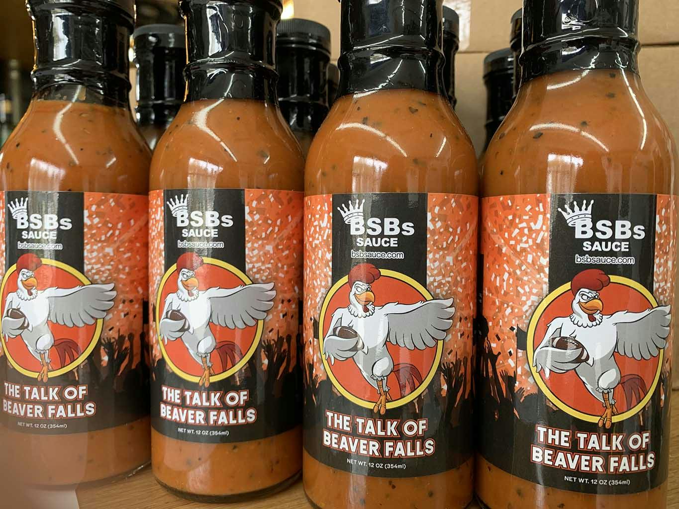 A bottle of The Talk of Beaver Falls wing sauce